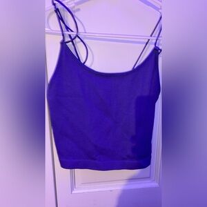 selling both blue and white crop tops